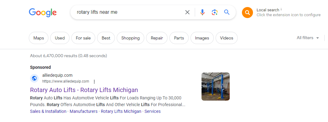 A screenshot of a Google search results page after searching the term "rotary lifts near me." The first result is a sponsored ad for the company Allied Equipment.